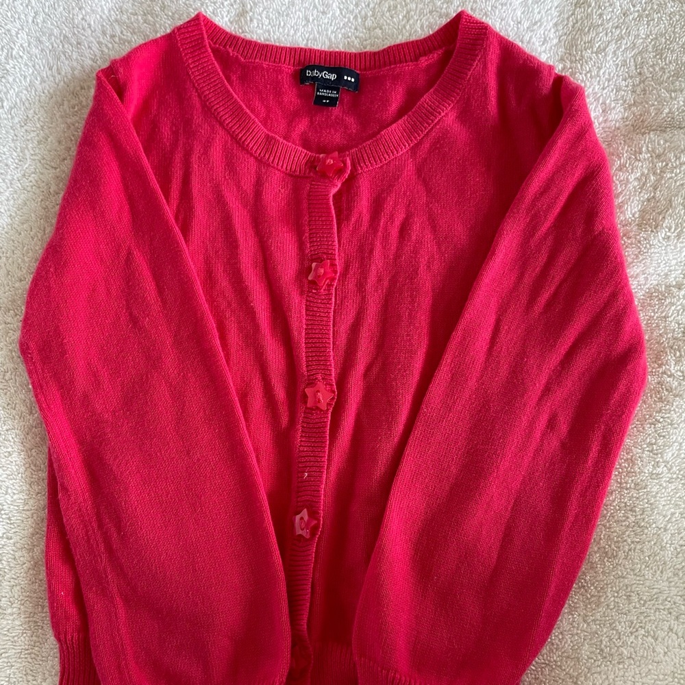 Deep pink girl’s cardigan